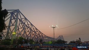 Howrah Bridge in Kolkata at sunset, header image for the richest YouTubers in Kolkata 2026 article