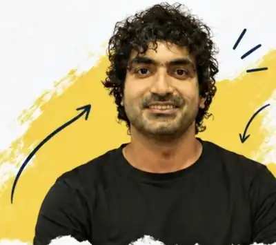 Rohit Soni, designer, visual thinker and founder of Doodle Project, smiling against a yellow brush-stroke background